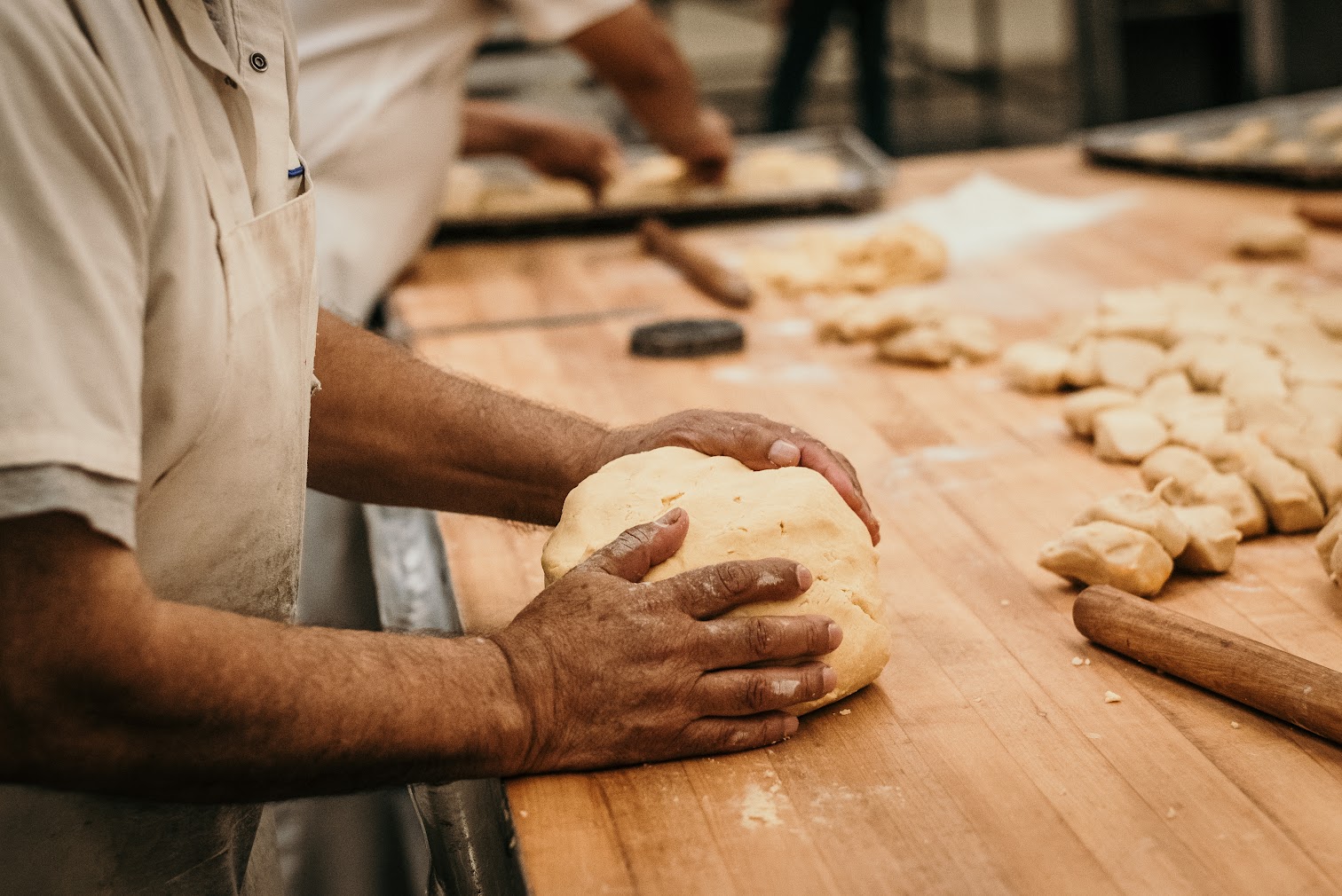 Baker kneading dough